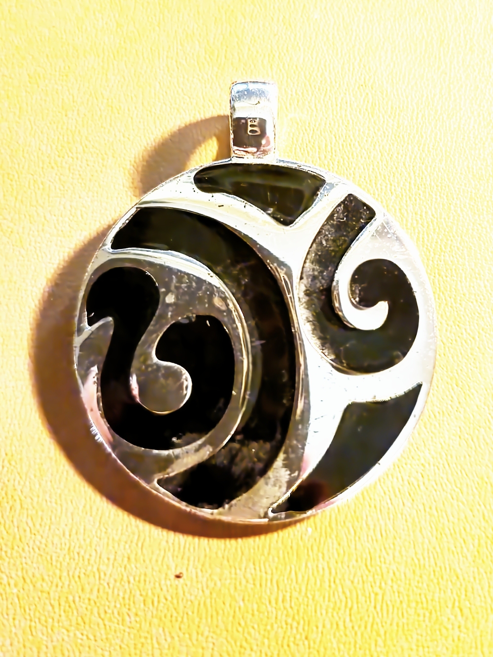 Black Enamel Swirl Round Pendant